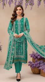 Green embroidered traditional outfit with dupatta, necklace, and jewelry on a beige background.
