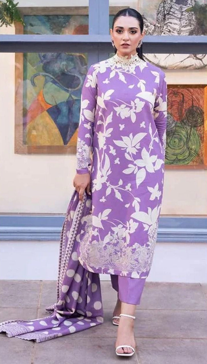 Woman wearing a purple printed outfit with 'Sapphire' branding on a white background