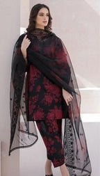 Sapphire Digital Printed Karandi outfit with a woman modeling it, featuring shirt, dupatta, and trousers.