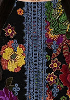 Traditional embroidered outfit with floral patterns and a model wearing it, set against a decorative background.